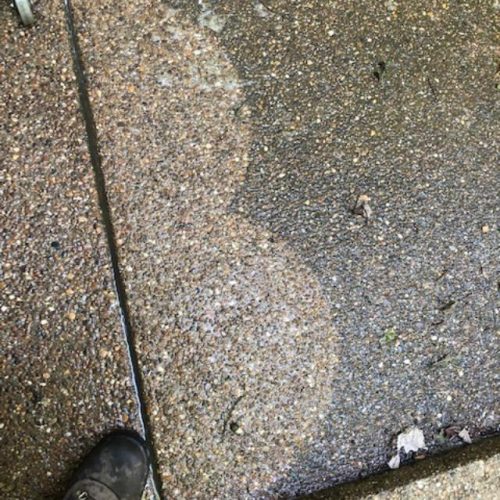 Cleaning Aggregate Concrete Sidewalk
